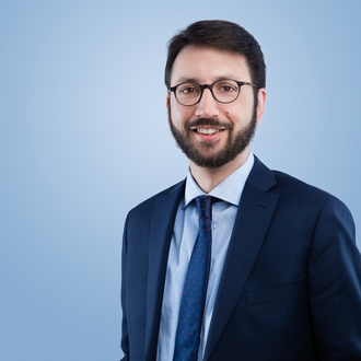Dr. Damien Carron
