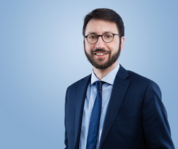 Dr. Damien Carron